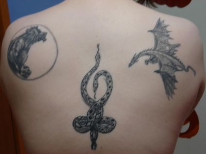 Multi Tattoo On Back